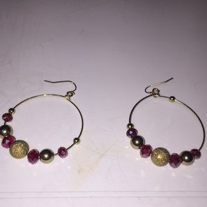 Standard gold hoops with gold and red jewels